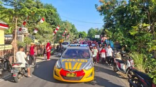 Polsek Sinjai Timur mengawal kegiatan jalan santai dan senam bersama dalam rangka memperingati HUT ke-81 Kemerdekaan Republik Indonesia di Desa Panaikang, Kecamatan Sinjai Timur, Kabupaten Sinjai, Minggu (16/8/2026). (Foto: RujukanNews)
