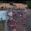 Kapolresta Gowa Kombes Pol Yusuf Usman bersama jajaran Polresta Gowa memperingati Hari Ulang Tahun ke-81 Kemerdekaan Republik Indonesia dengan membawa Sang Saka Merah Putih ke kawasan Bendungan Bili-Bili, Kabupaten Gowa, Sulawesi Selatan. (Foto: Potongan Video Polresta Gowa)